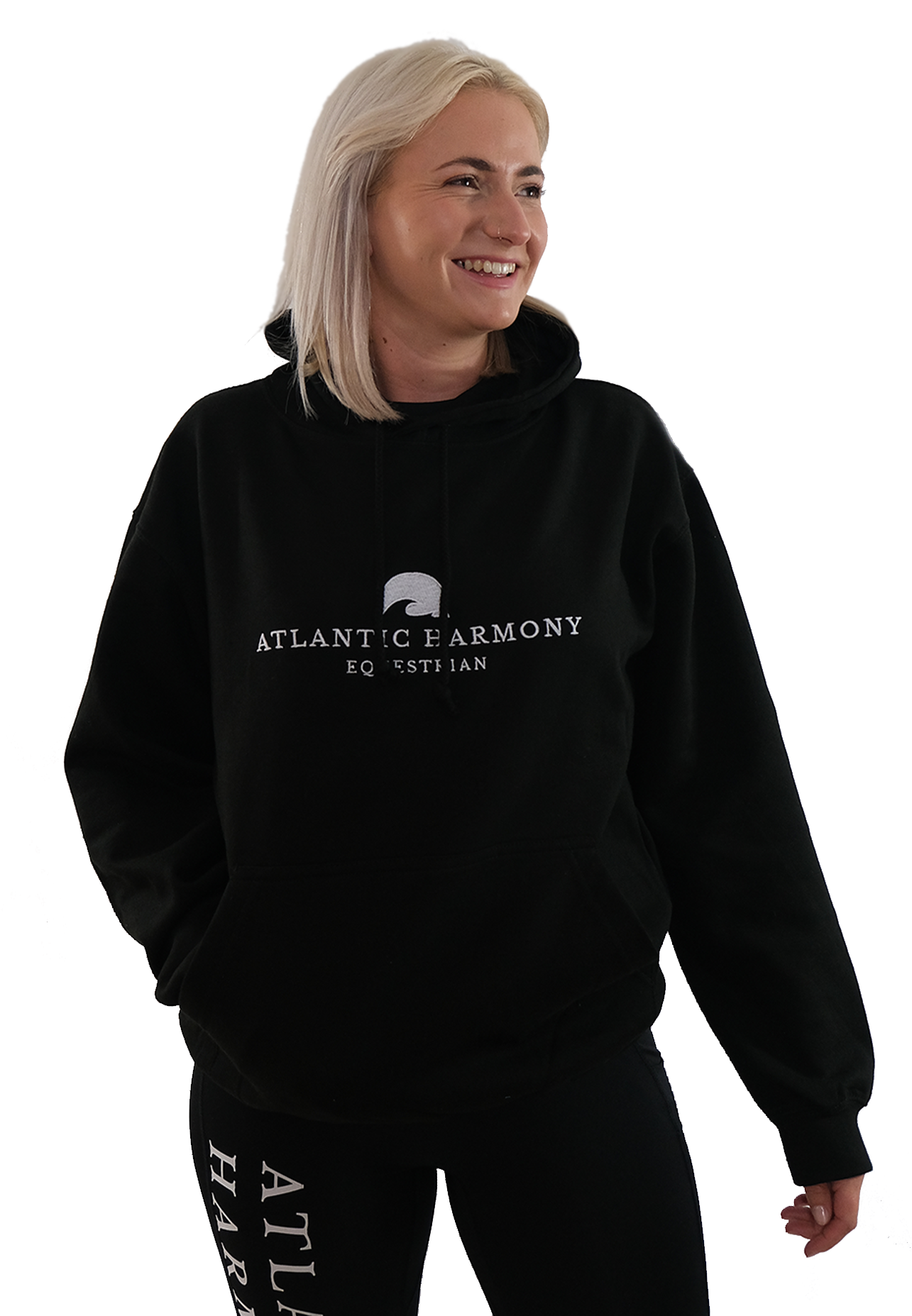 Blonde haired female wearing Black Equestrian Hoodie for riding and yard tasks