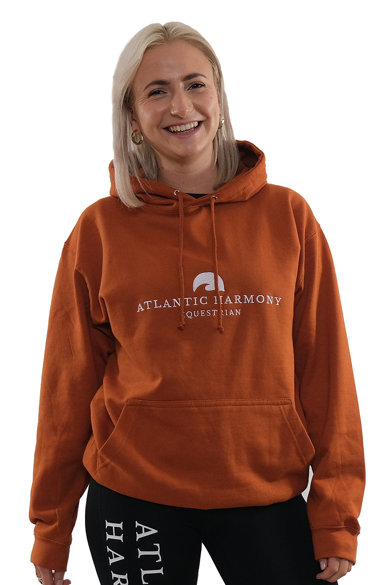 Blonde haired female wearing Orange Equestrian Hoodie for riding and yard tasks 