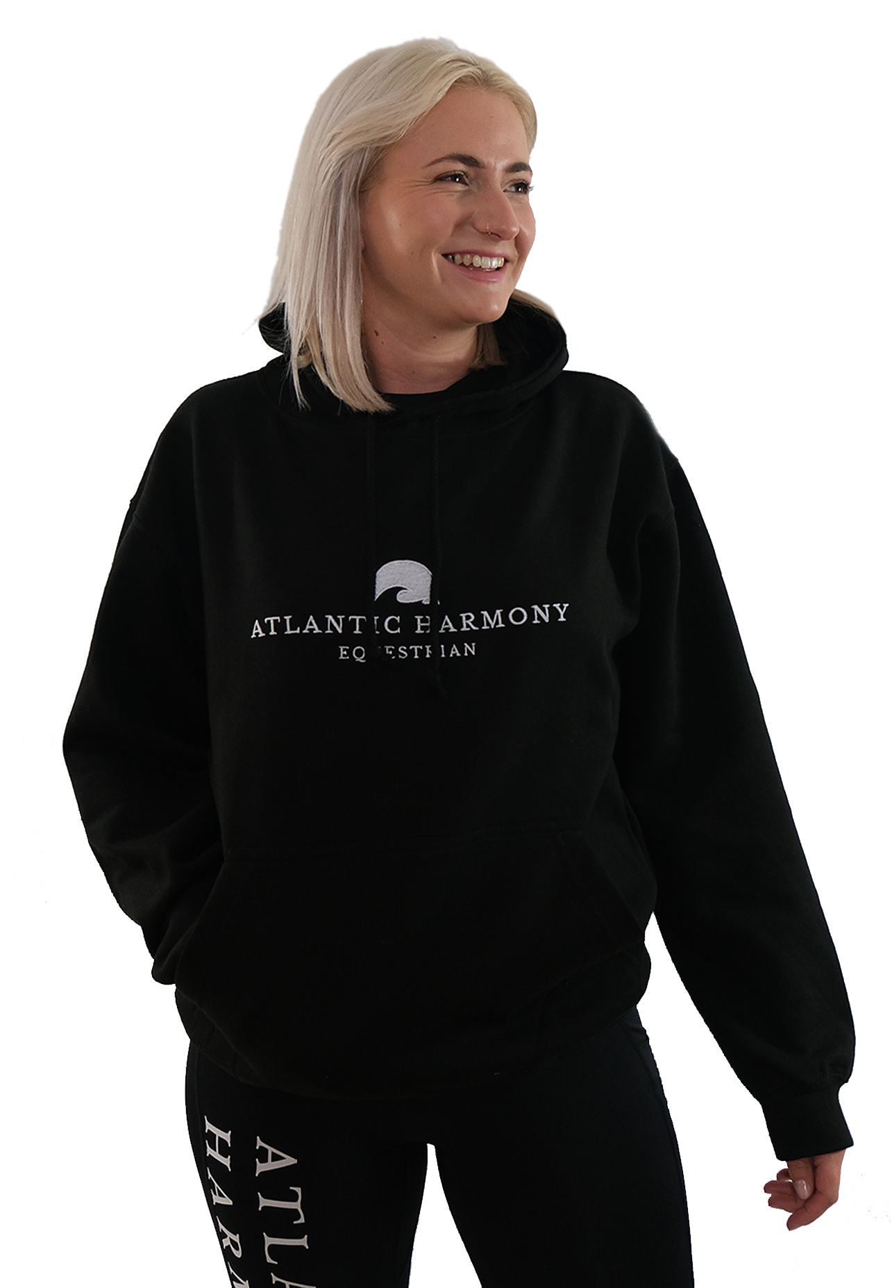 Blonde haired female wearing Black Equestrian Hoodie for riding and yard tasks 